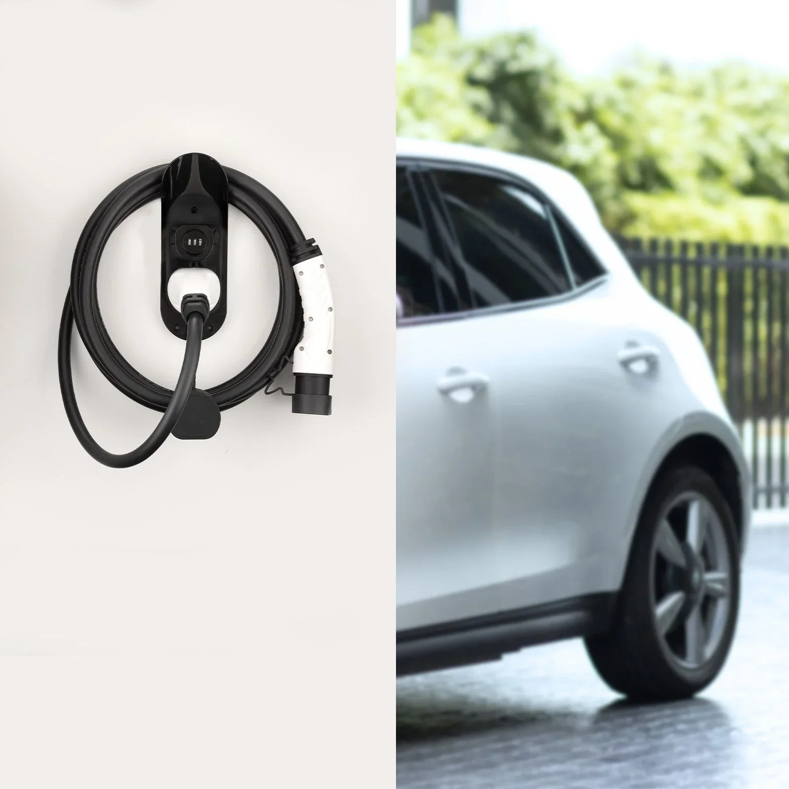 EV charger cable mounted on wall next to a white electric car in driveway
