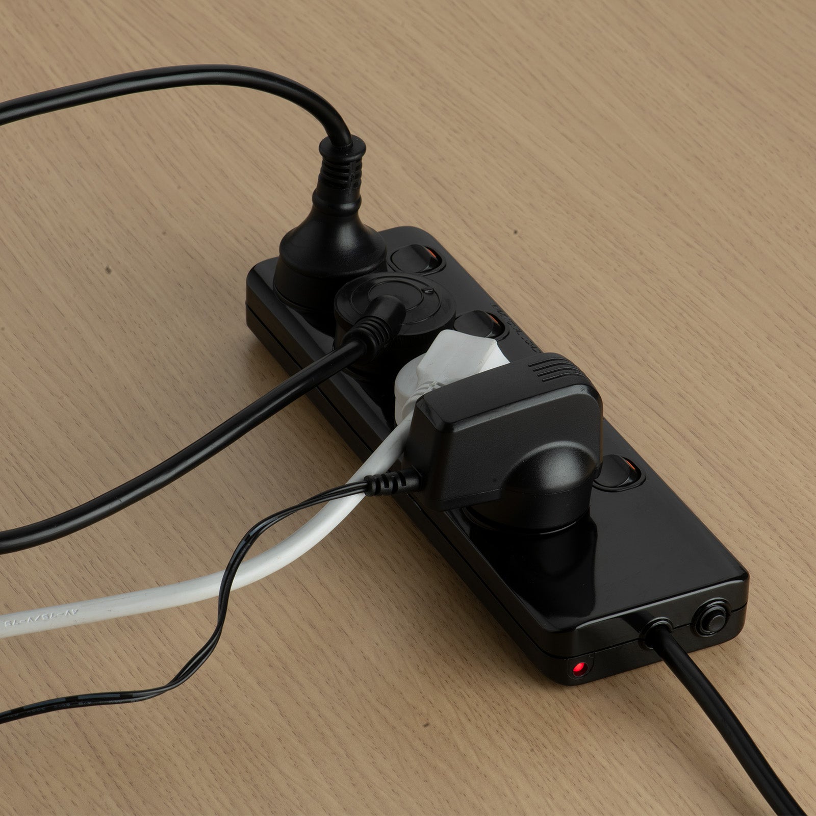 Arlec 4 Outlet Black Individually Switched Powerboard with Safety Overload Warning Alarm - overload alarm board, black powerboard, switched surge protector