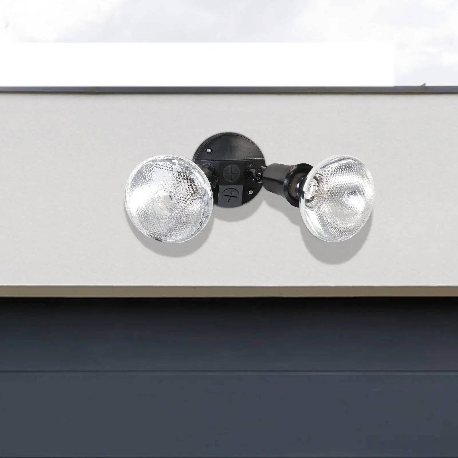 Arlec black 150W compact twin security flood light mounted on exterior wall