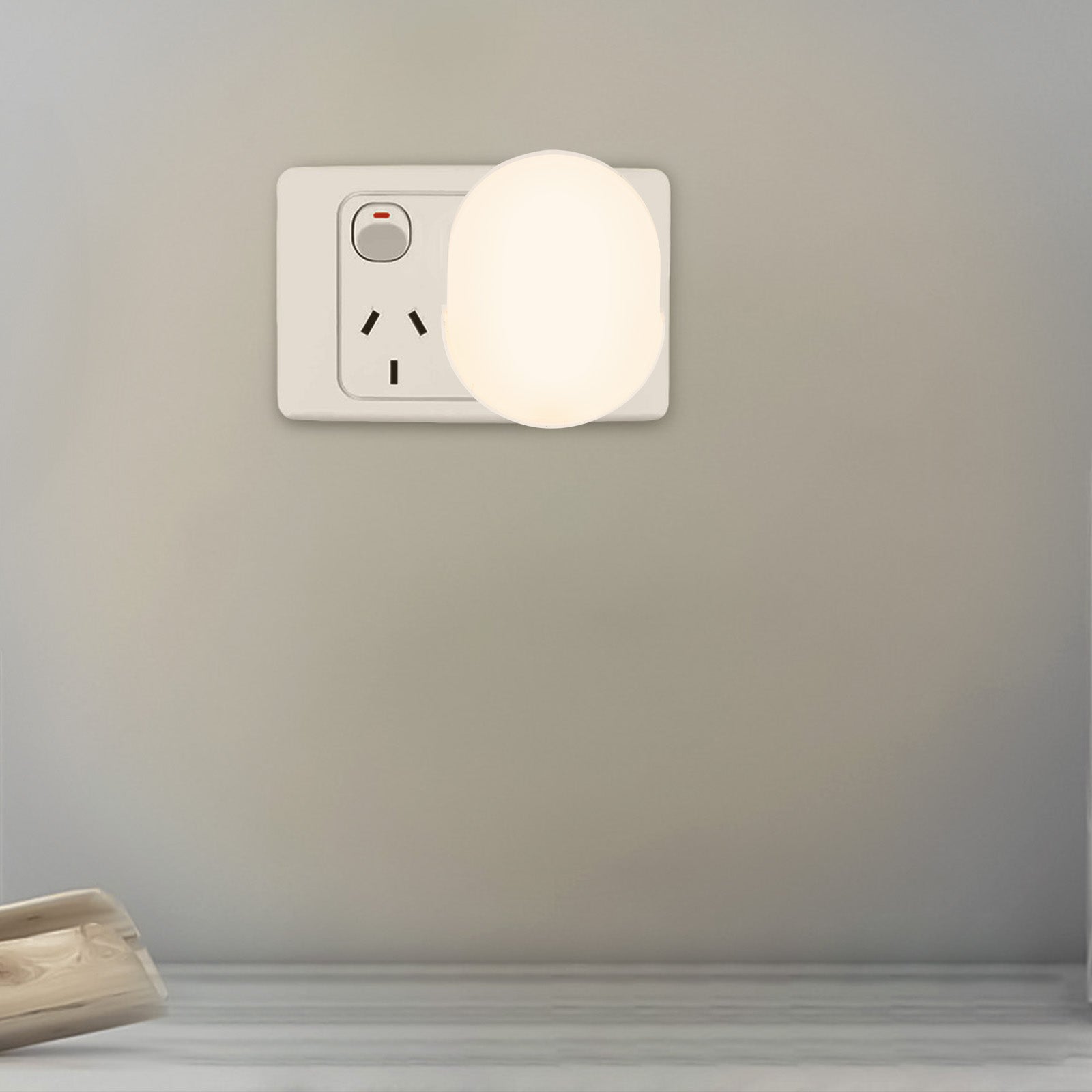 Arlec dusk-to-dawn sensor plug-in LED night light, soft warm glow for indoor use