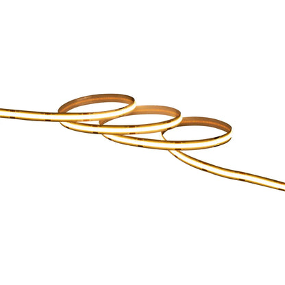 Flexible LED strip light emitting warm white glow on white background