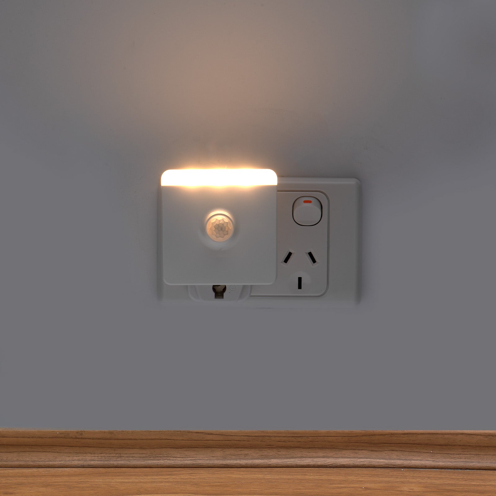 Arlec square plug-in motion sensor night light with warm white LED and auto shut-off